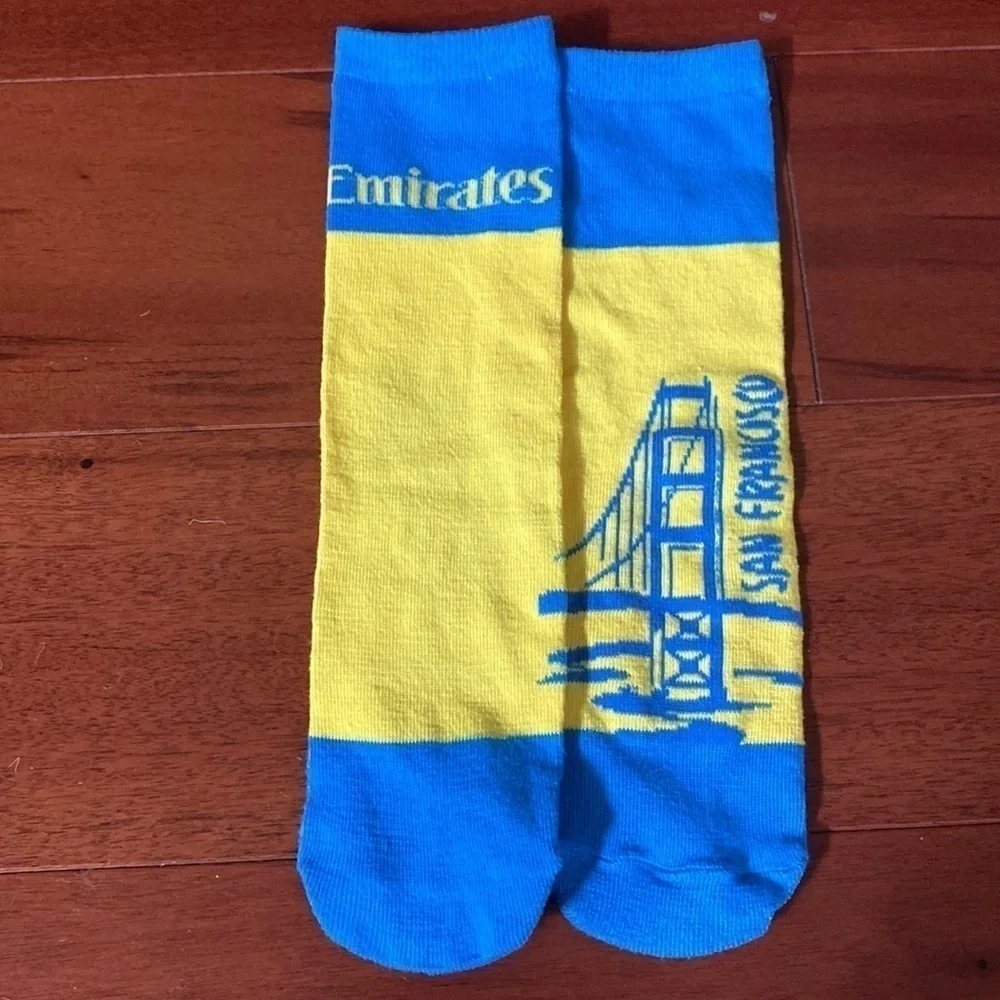 Emirates Airlines blue and yellow kids San Francisco flight socks
